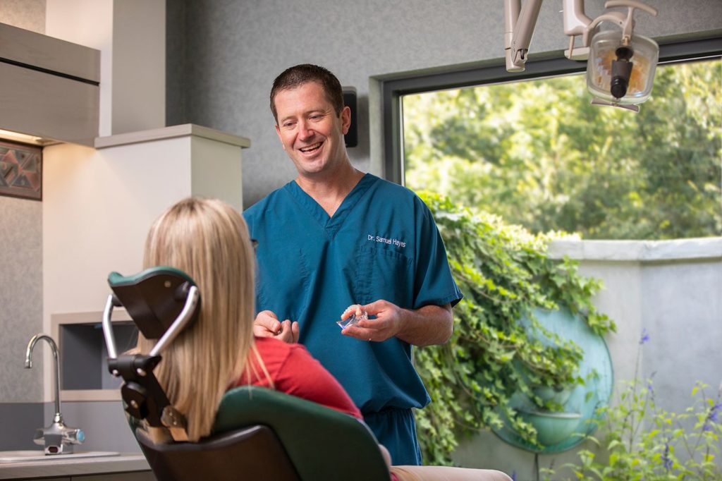 Dr. Hayes providing a Dental Implant consultation